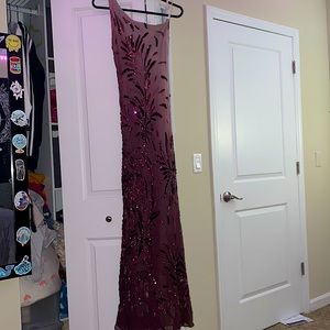 a purple size 8 skin tight dress